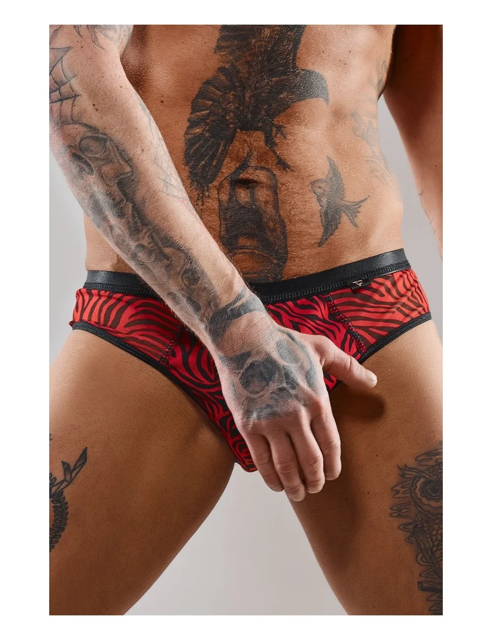 Slip type brésilien ouvert zébré rouge et noir - Regnes Slip type brésilien ouvert zébré rouge et noir - Regnes